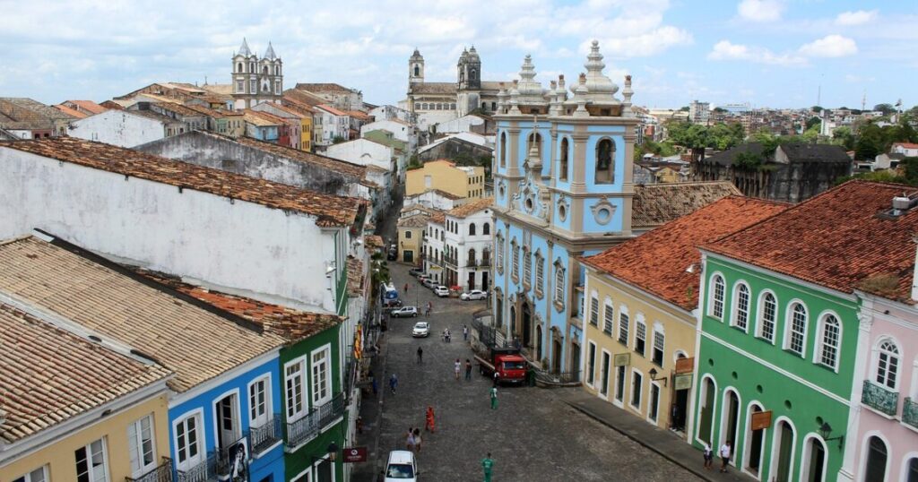 High-angle view of Pelourinho, Salvador, showcasing colorful colonial buildings and bustling street activity