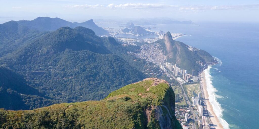 Aerial view of Rio de Janeiro from Pedra da Gávea, showcasing lush green mountains, Mountain, cityscape, and coastline